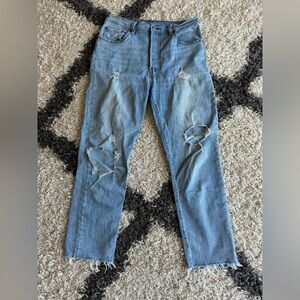 Levi’s 501 button fly distressed jeans